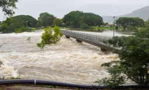 Australia floods 2025, Queensland flooding update, Townsville flood crisis, Climate change impact Australia, Ross River Dam flooding, Extreme weather Australia,