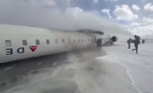 Delta plane crash Toronto, Toronto Pearson Airport incident, Bombardier CRJ900 crash, Flight 4819 crash, Toronto plane flip, Endeavor Air accident,