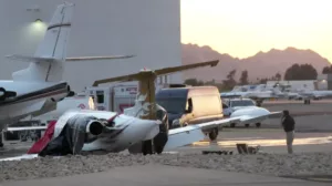 Scottsdale plane crash, Vince Neil jet crash, Learjet 35A accident, Scottsdale Airport incident, Arizona plane collision, NTSB investigation,