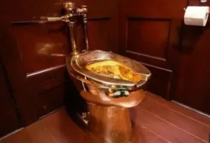 Golden toilet theft, Blenheim Palace, Maurizio Cattelan artwork, Solid gold toilet, Art theft UK, £4.8 million toilet